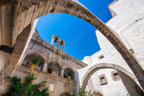 Fototapeta Naklejka Na Ścianę i Meble -  Streets of Chora and iconic Monastery of Saint John the Theologian in chora of Patmos island, Dodecanese, Greece