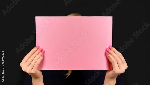 Pretty in Pink: Woman Holding Large Banner © Behram