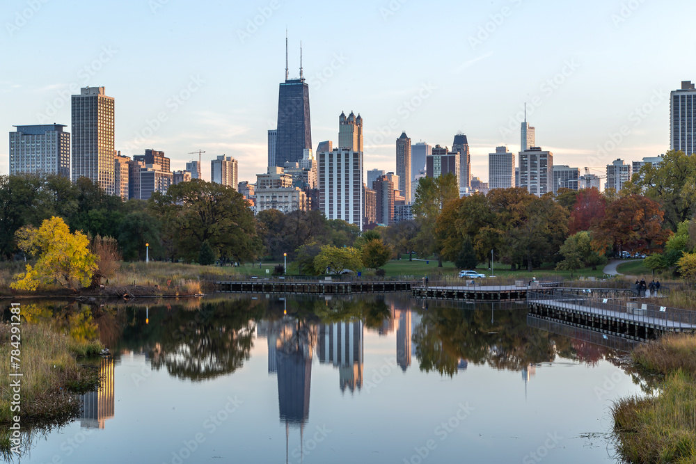 Chicago skyline with skyscrapers viewed from Lincoln Park over lake