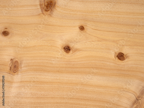 European cypress veneer surface with multiple natural knots