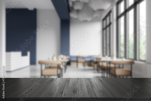 Empty wood table top with a blurred cafe interior background, ideal for display or montage of a product, 3D Rendering. photo