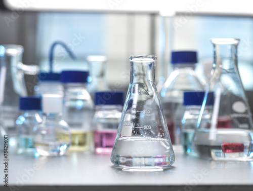 Laboratory glassware being used to develop a chemical formula. photo