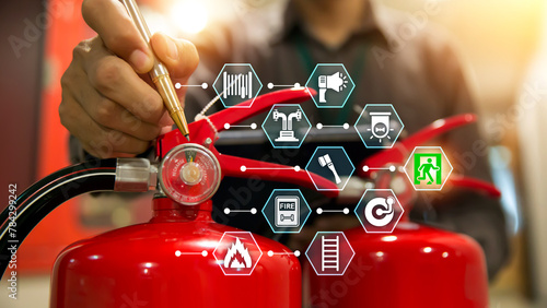 Fotografía Fire extinguisher has engineer checking with fire protection icons symbol to prepare fire equipment for prevention in emergency case and safety or rescue and alarm system training concept