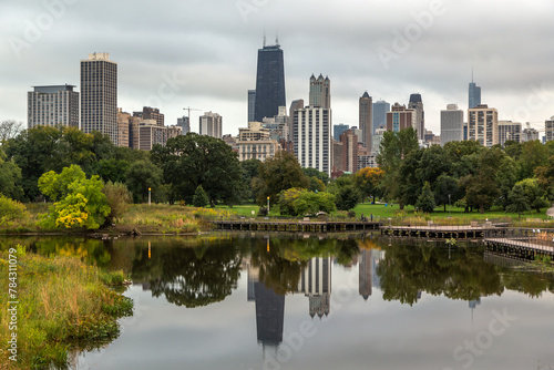 Downtown skyline and South Pond at Lincoln Park.	