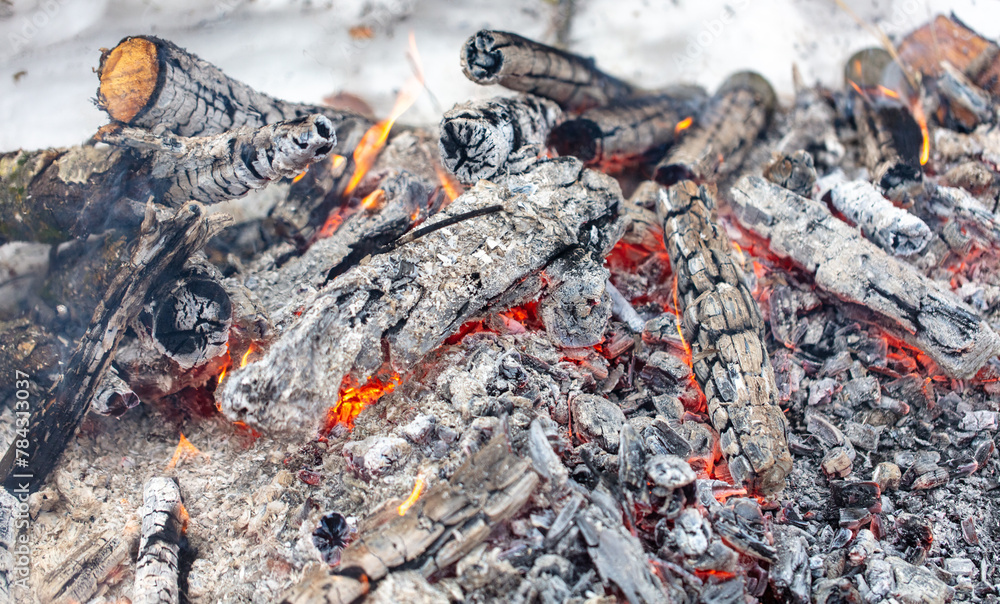 Burning coals in a fire as a background Burning coals in a fire as a background