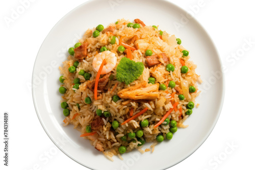 Crab fried rice with large pieces of crab meat, shrimp, green peas, carrots on a white plate, Isolated on transparent background.