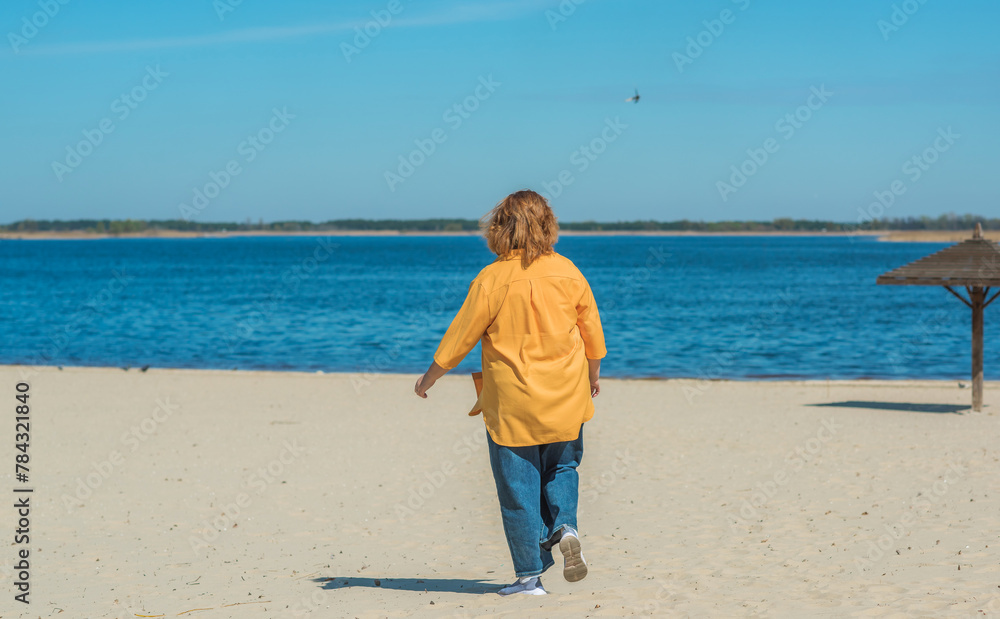  Overthinned middle aged woman thinking about something, crisis of middle age and problems among overweight people