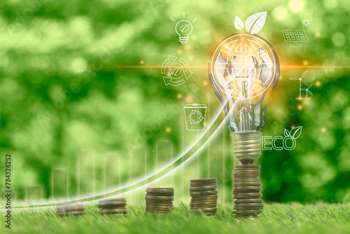 A green background with a light bulb and a bunch of coins