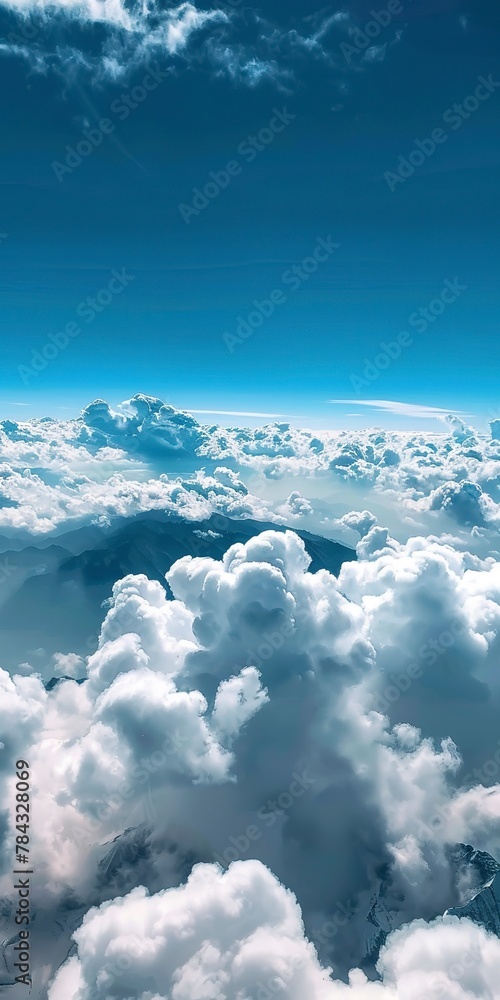 High altitude clouds, close up, from mountain peak, clear sky High altitude clouds, close up, from mountain peak, clear sky