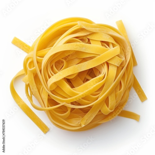 Close-up top view of a single nest of tagliatelle egg pasta on a white background.