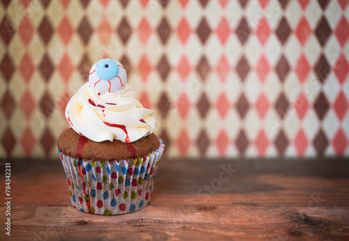 Halloween design cupcake on dark background