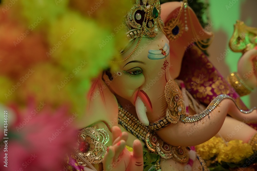 Fototapeta premium Colorful statue of Ganesha in the temple