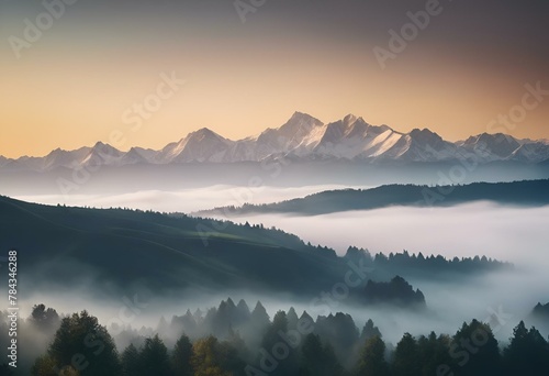 an expansive landscape is seen with fog on the mountains above