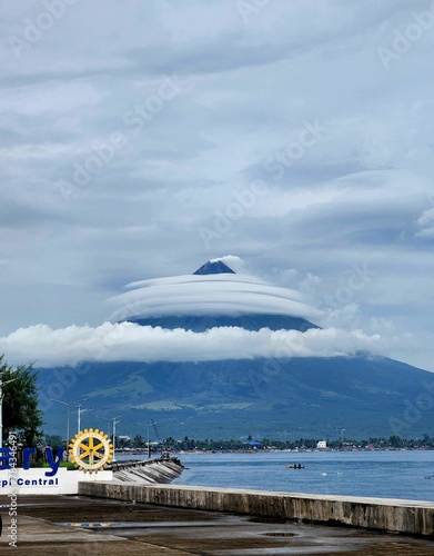 Beautiful landscape of the Mayon Volcano on a cloudy day photo