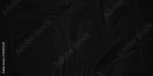 Dark black crumple paper wrinkled poster template  blank glued creased paper texture background. black paper crumpled backdrop background. used for cardboard.  