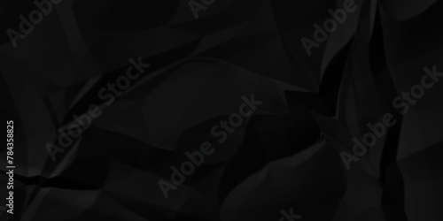 Dark black crumple paper wrinkled poster template ,blank glued creased paper texture background. black paper crumpled backdrop background. used for cardboard.