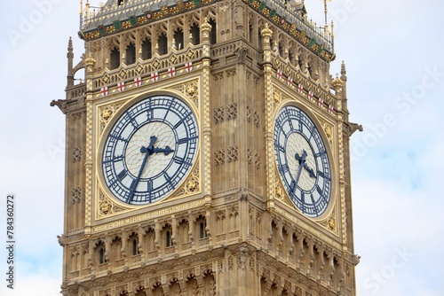 Big Ben in London, UK under a cloudy sky on a sunny day