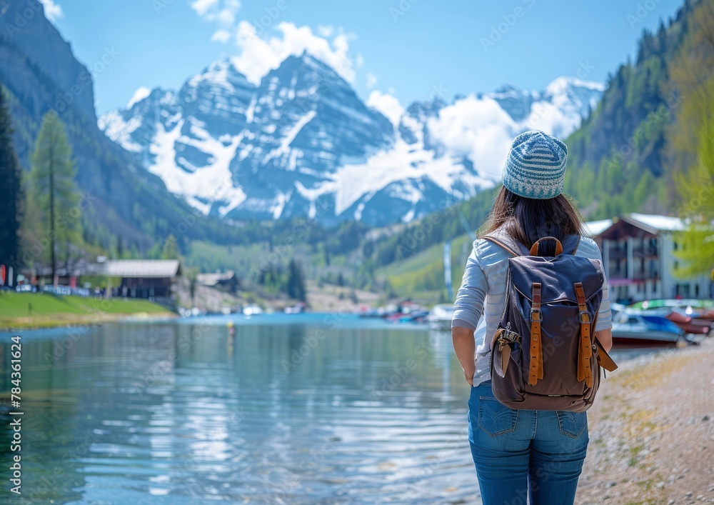 The Wanderers Solitude: A Womans Gaze at the Majestic Mountain Lake