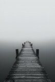 AI generated illustration of a wooden footbridge on body of water in greyscale