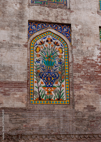 Historical Islamic art work tiles on mosque wazir khan lahore pakistan photo