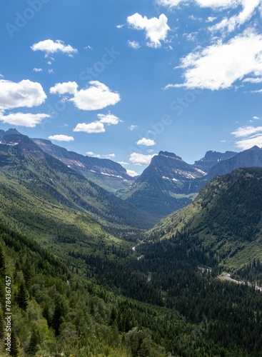 Breathtaking view of the Glacier national park under a bright cloudy sky © Wirestock