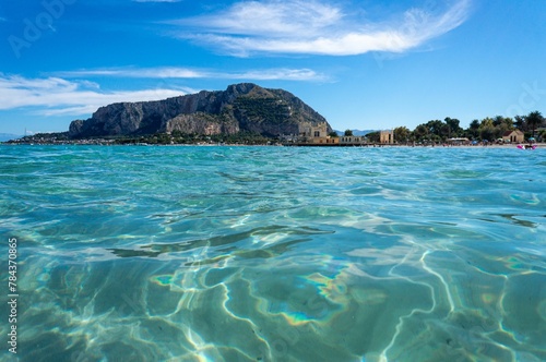 Beautiful crystal clear waters of sandy Mondello Beach in the Italian region of Sicily photo