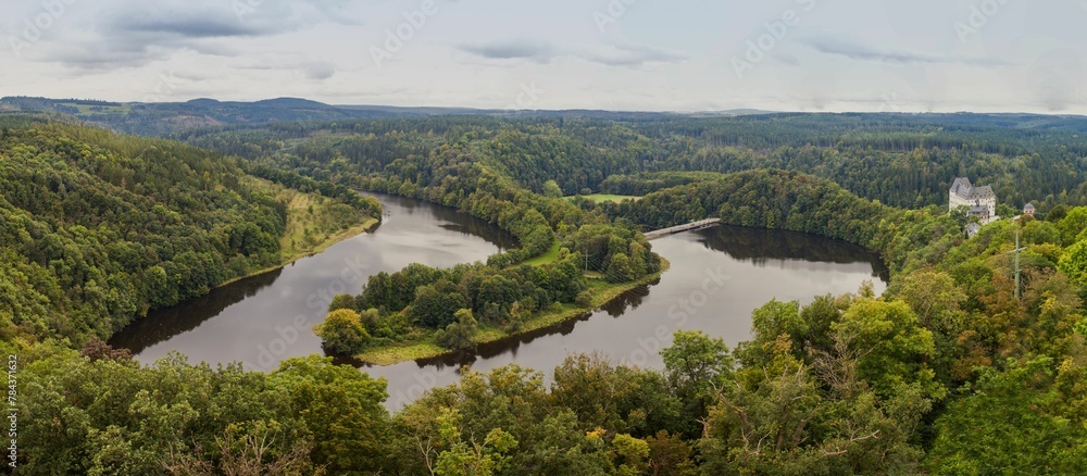 Panoramic shot of the Thuringian Sea reservoir in the Saale valley surrounded by green woods,Germany