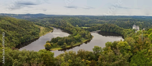 Panoramic shot of the Thuringian Sea reservoir in the Saale valley surrounded by green woods,Germany photo