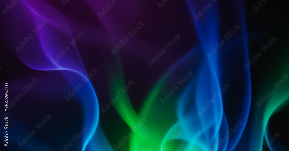 Abstract green, blue, and purple flames on a black background.