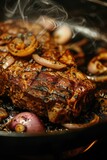 A sizzling steak cooking in a skillet with onions. Perfect for food and cooking related projects