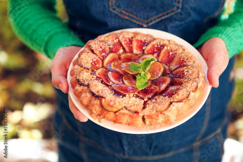 Homemade fig pie with nuts and honey photo