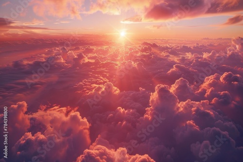 Beautiful sunset scene with clouds in the sky. Perfect for backgrounds or nature-themed designs