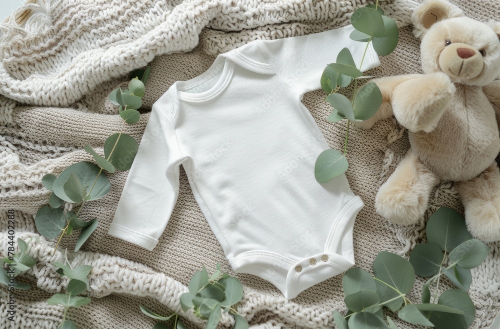 Cozy Blanket Onesie Mockup with Teddy Bear and Eucalyptus Leaves Cozy Blanket Onesie Mockup with Teddy Bear and Eucalyptus Leaves