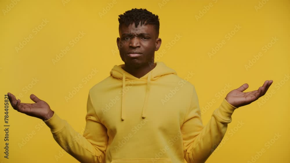 Man Expressing Doubt and Confusion on Yellow Man Expressing Doubt and Confusion on Yellow