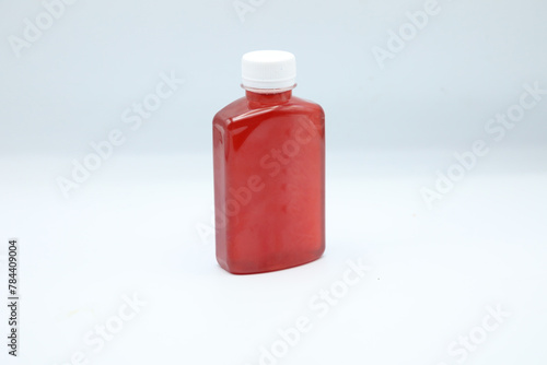 Red fruit juice in a jar
