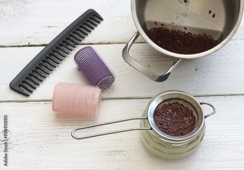 Making natural hair setting lotion for perfect hair. Boiled flax seed filtered into a jar. Organic and healthy stylish hair lotion.