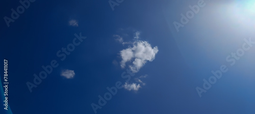 Blue sky background. Natural background. Panorama sky with tiny clouds © FlorianSchultze