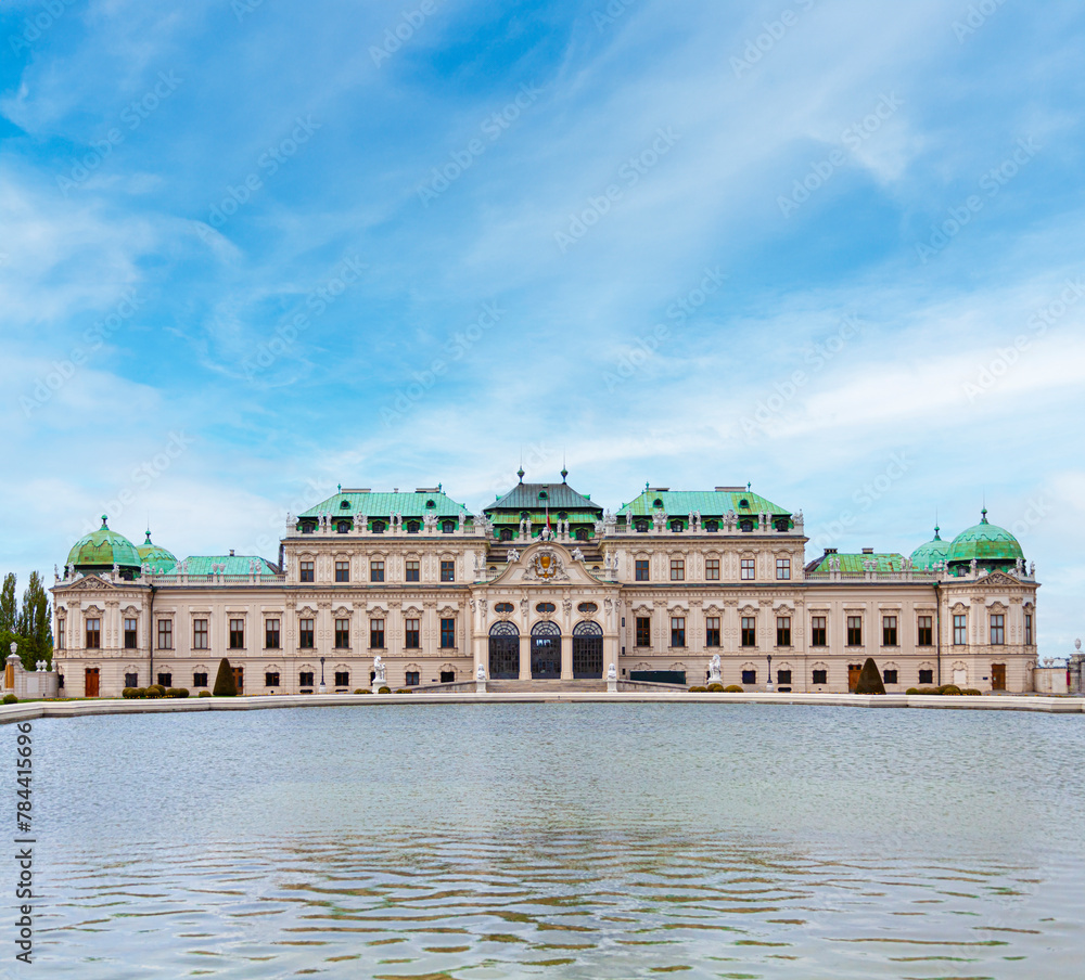 Belvedere Palace Austria, landmark attraction with ornate facade, fountains, statues and reflection pool