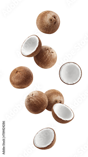 Falling coconuts isolated on white background, full depth of field