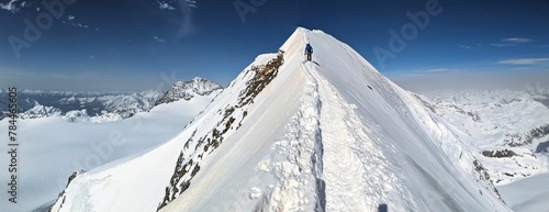 Ski tour to the Piz Palü in the Bernina group in the canton of Graubünden. Ski mountaineering on mountain peak Piz Palü over glacier in a fantastic mountain world. High quality photo