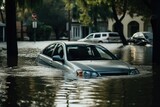 Submerged car in a flooded street due to heavy rain