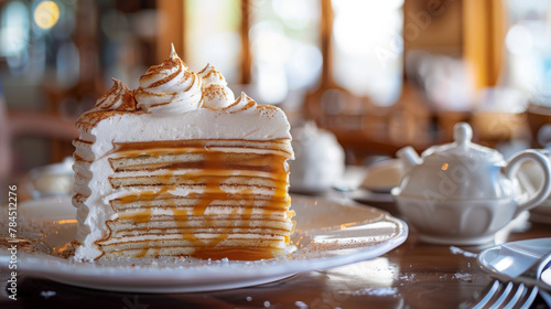 Exquisite argentinian layered cake with dulce de leche and meringue, served in a cafe