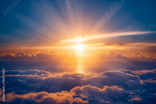 Sun rising and setting over a vast ocean, clouds morphing and changing photo