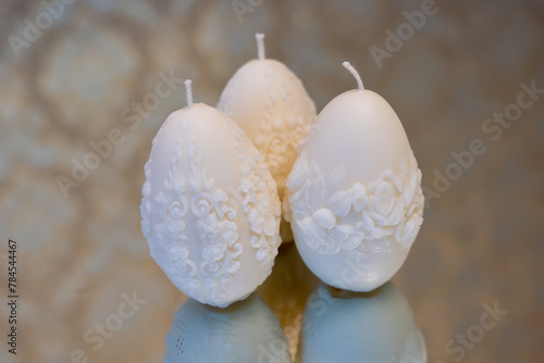White easter egg soy wax candles. Mirror background