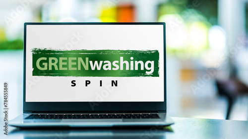 Laptop computer displaying the sign of Greenwashing