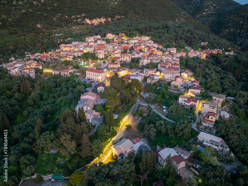 Aerial drone view of traditional Episkepsi village in north corfu,Greece by night, Summer time photo