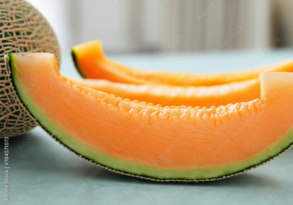 Close up Slices of cantaloupe on table Close up Slices of cantaloupe on table
