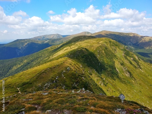 Scenic view of a mountain range on a bright summer day