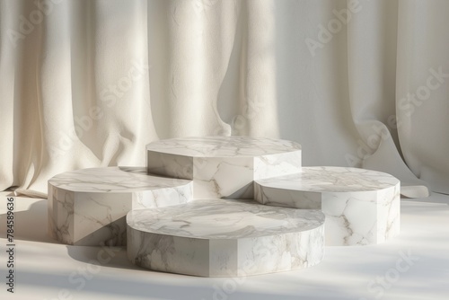 4 white marble hexagonal podiums on a simple background for product display