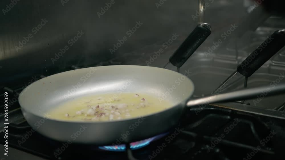 Frying Pan With Olive Oil Juice And Putting Black Ink Squid Spaghetti Pasta Frying Pan With Olive Oil Juice And Putting Black Ink Squid Spaghetti Pasta